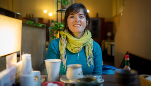 Woman with a Scarf Drinking Coffee