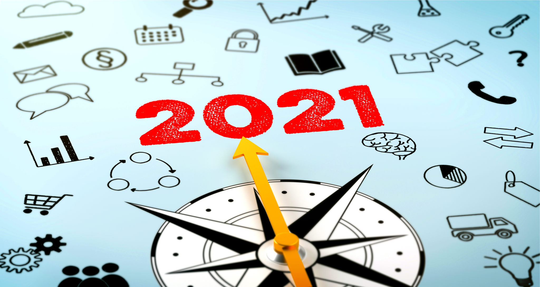 A compass with the arrow pointing at the text 2021