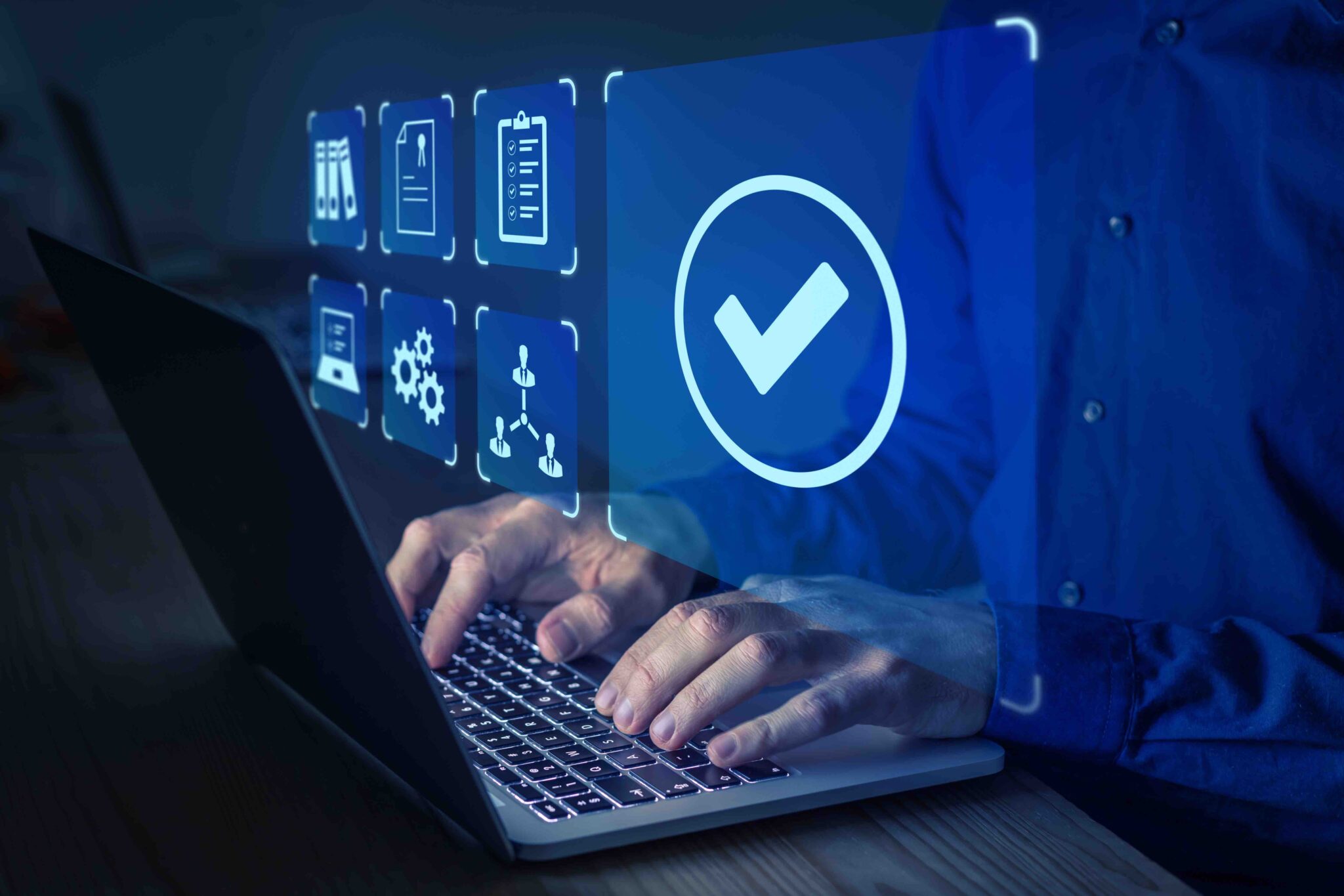 fingers on a keyboard with superimposed audit checklist